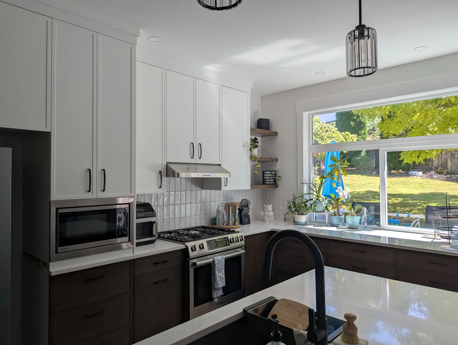 Rogers Renovation custom kitchen with rift cut white oak lower cabinets