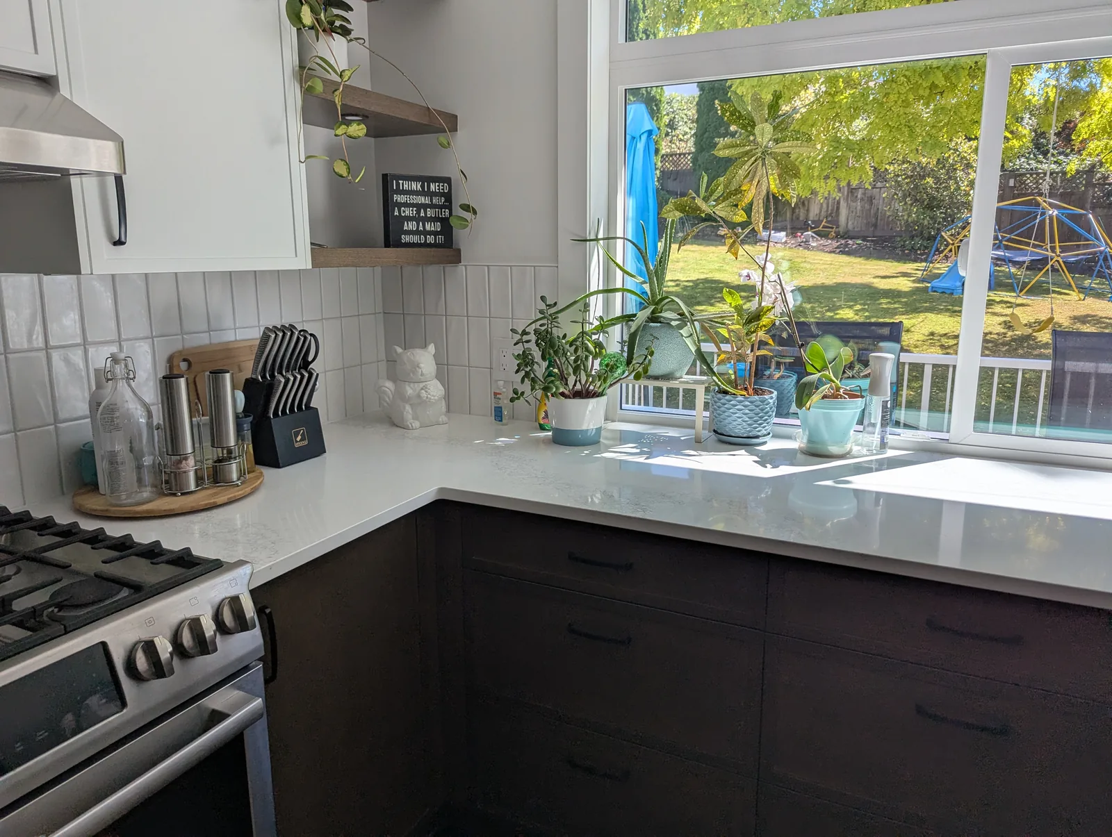 Rift cut white oak lower kitchen cabinets with quartz countertop